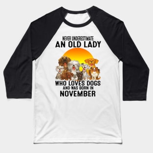 Never Underestimate An Old November Lady Who Loves Dogs Baseball T-Shirt